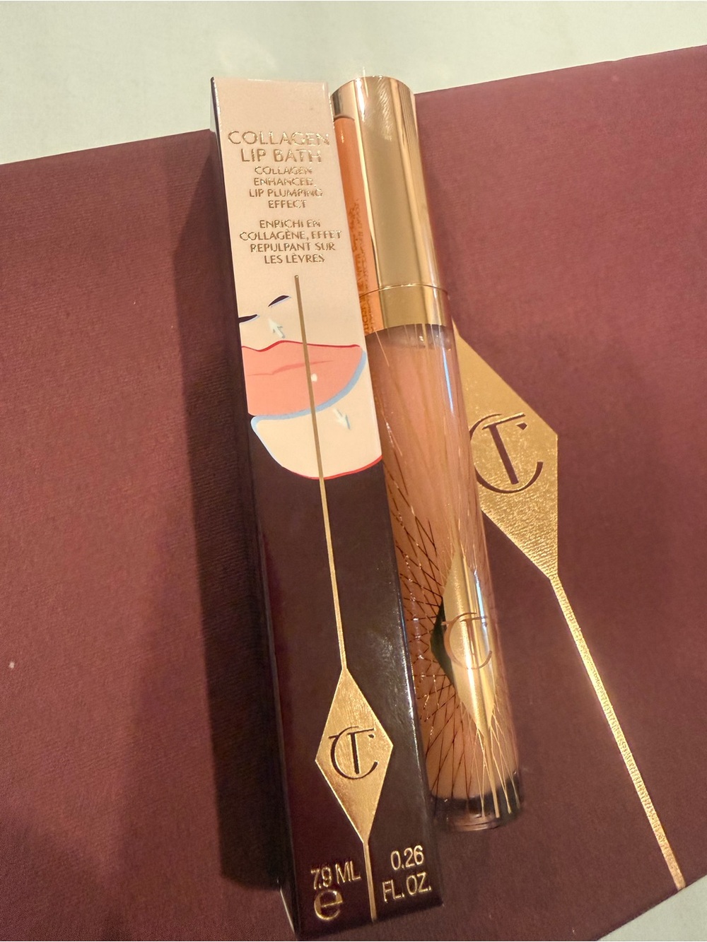 Charlotte Tilbury Lip Bath Gloss โ Sheer Peachy Nude with Gold Accents